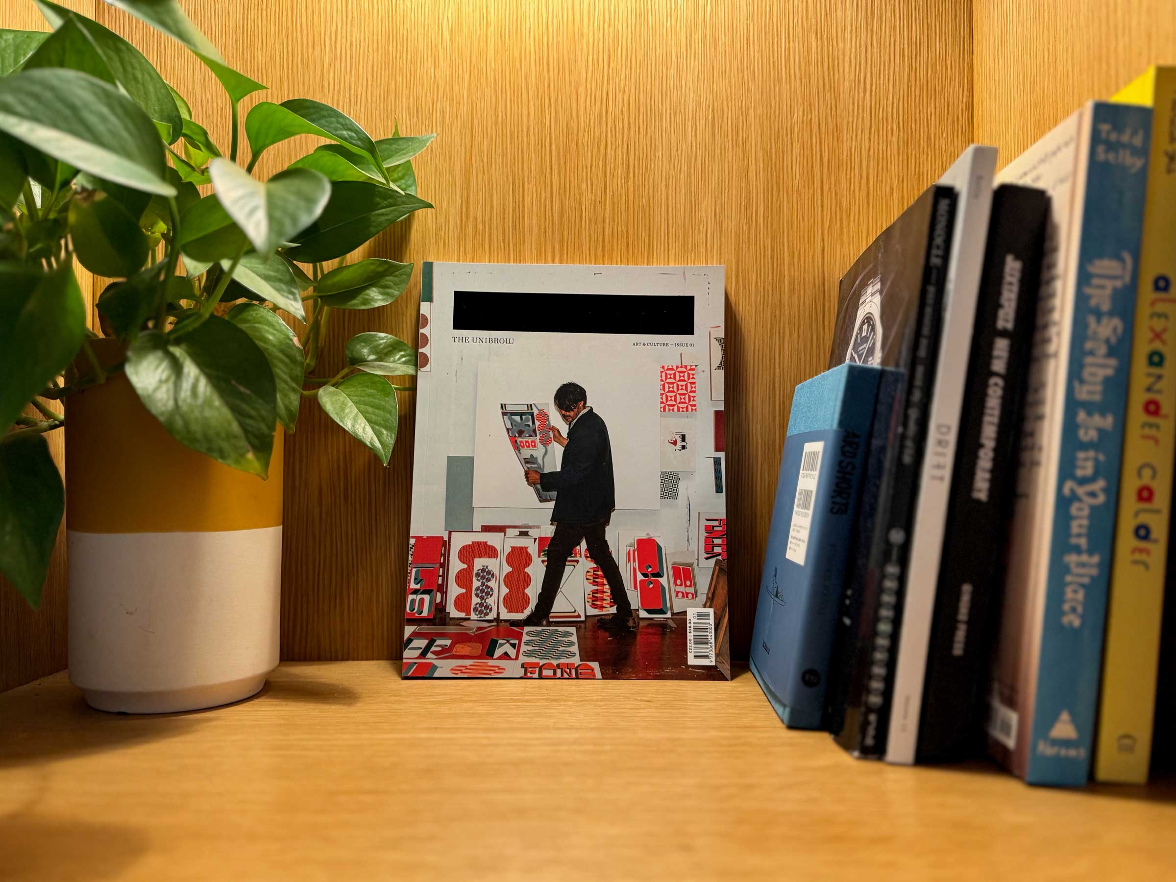 The Unibrow magazine displayed on a shelf